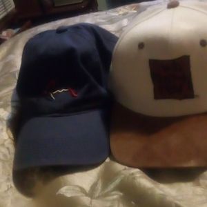 1greg norma cap and 1 kc cap